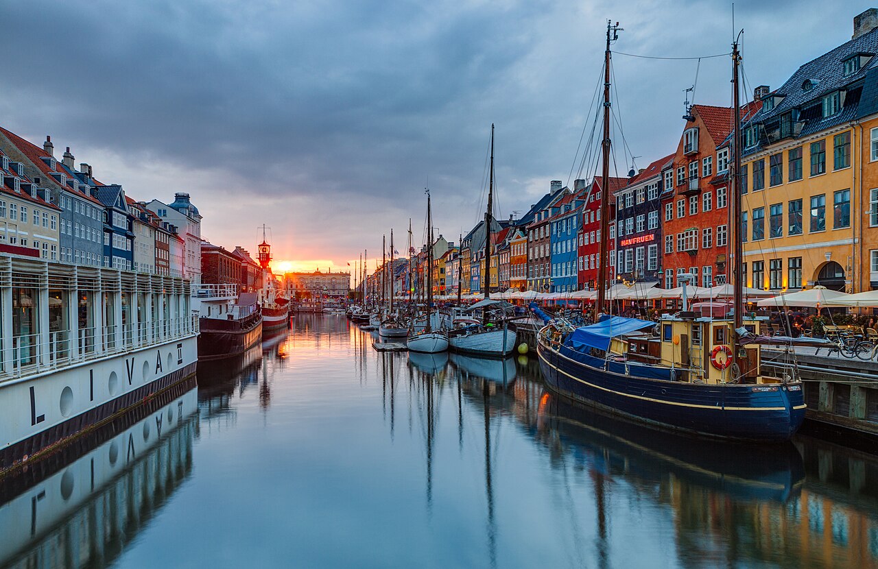 Nyhavn harbor in Copenhagen at sunset